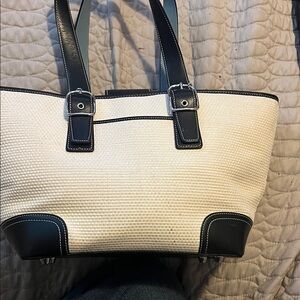 Elegant Black and Cream coach Bag